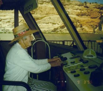 Granny driving a houseboat